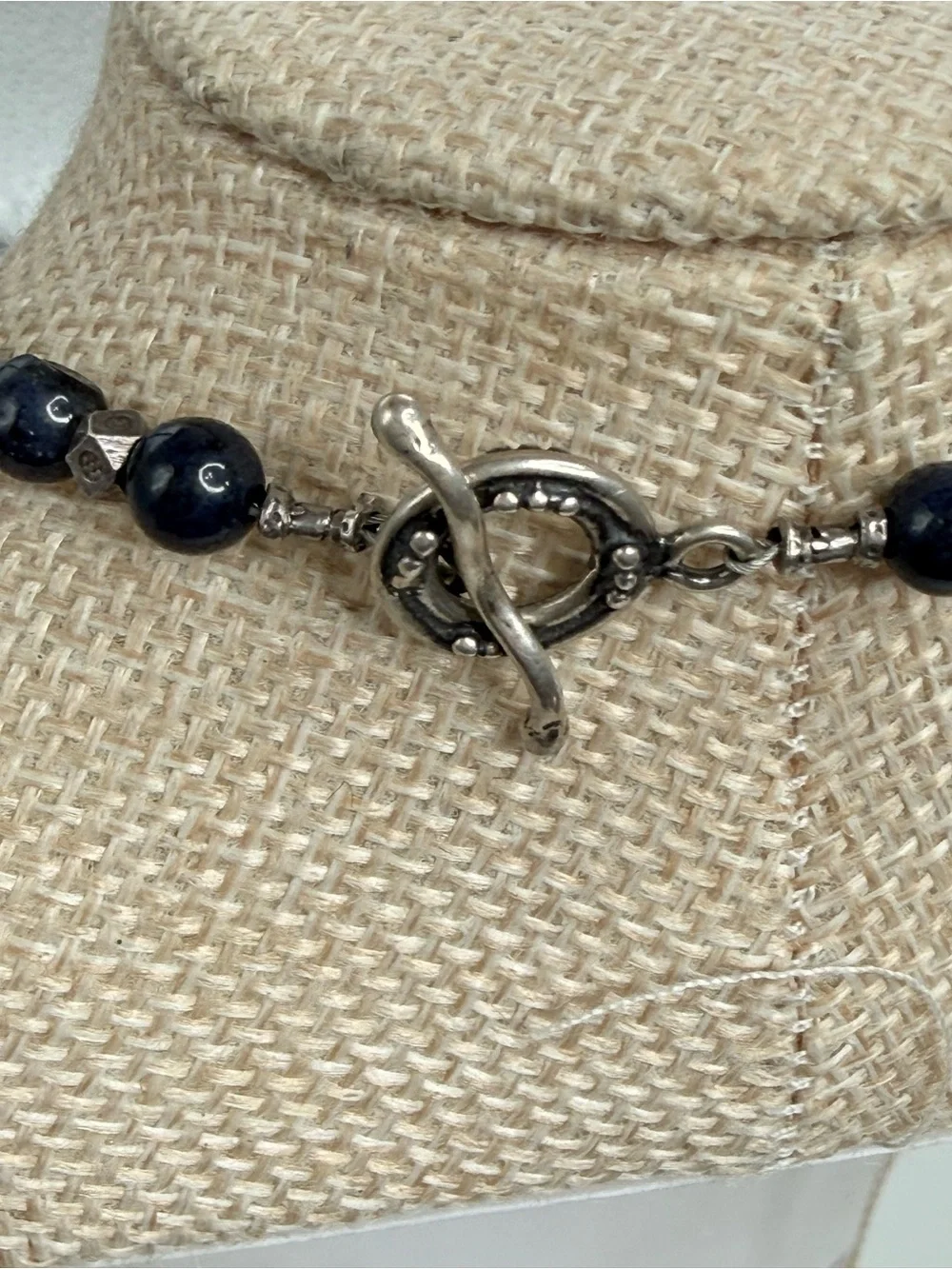 sterling silver necklace dark blue lapis lazuli beads geometric silver accents.